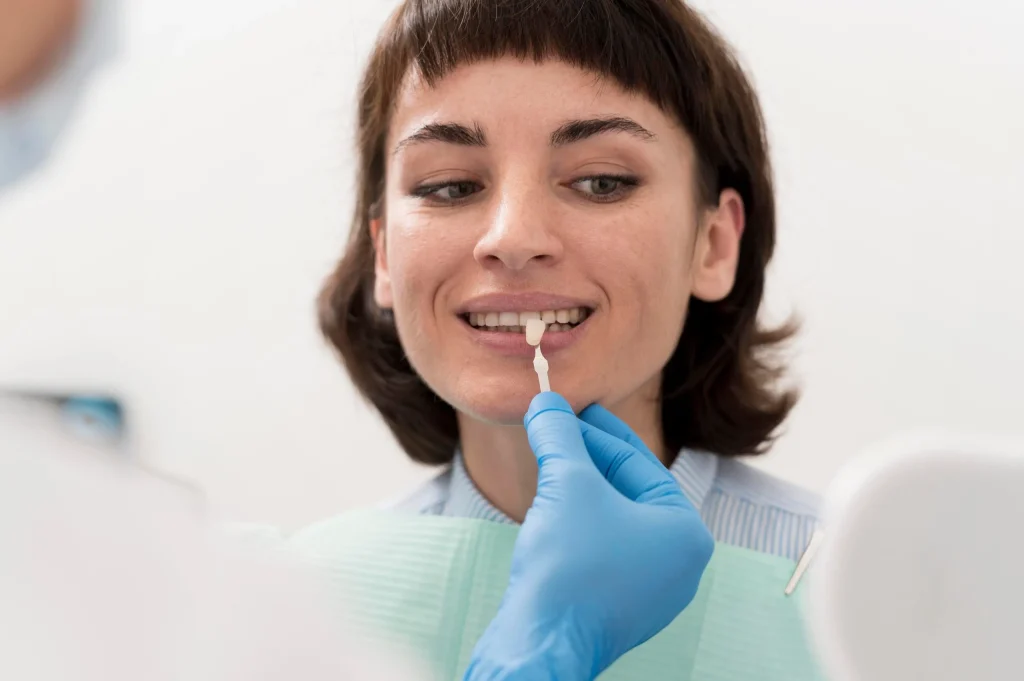 Dental bridges replace missing teeth, while crowns cover and restore damaged teeth.